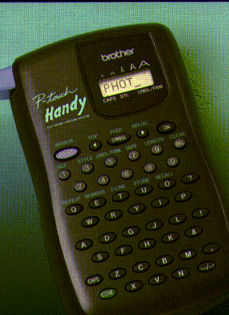 Brother P-touch PT-200 handheld label maker with four-character LCD and QWERTY keypad, shown in its original U.S. brochure