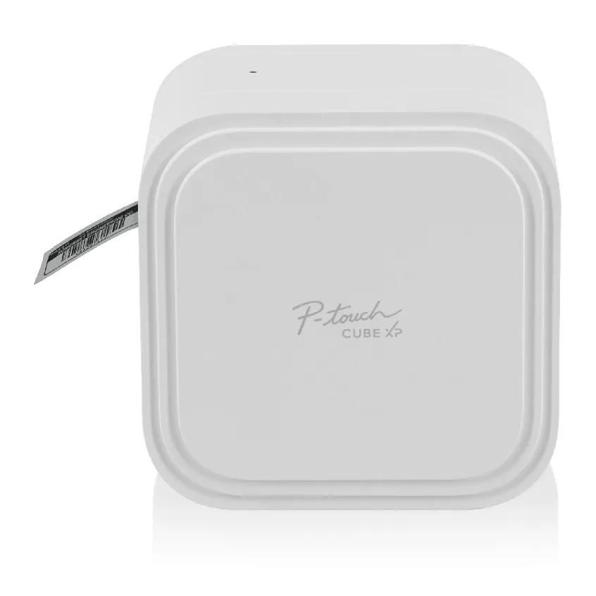 Brother P-touch CUBE XP PT-P910BT white square label printer with its tape exiting the side