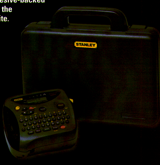 Brother Stanley ST-1150DX keyboard label maker with its carrying case, cropped from the exact manufacturer brochure